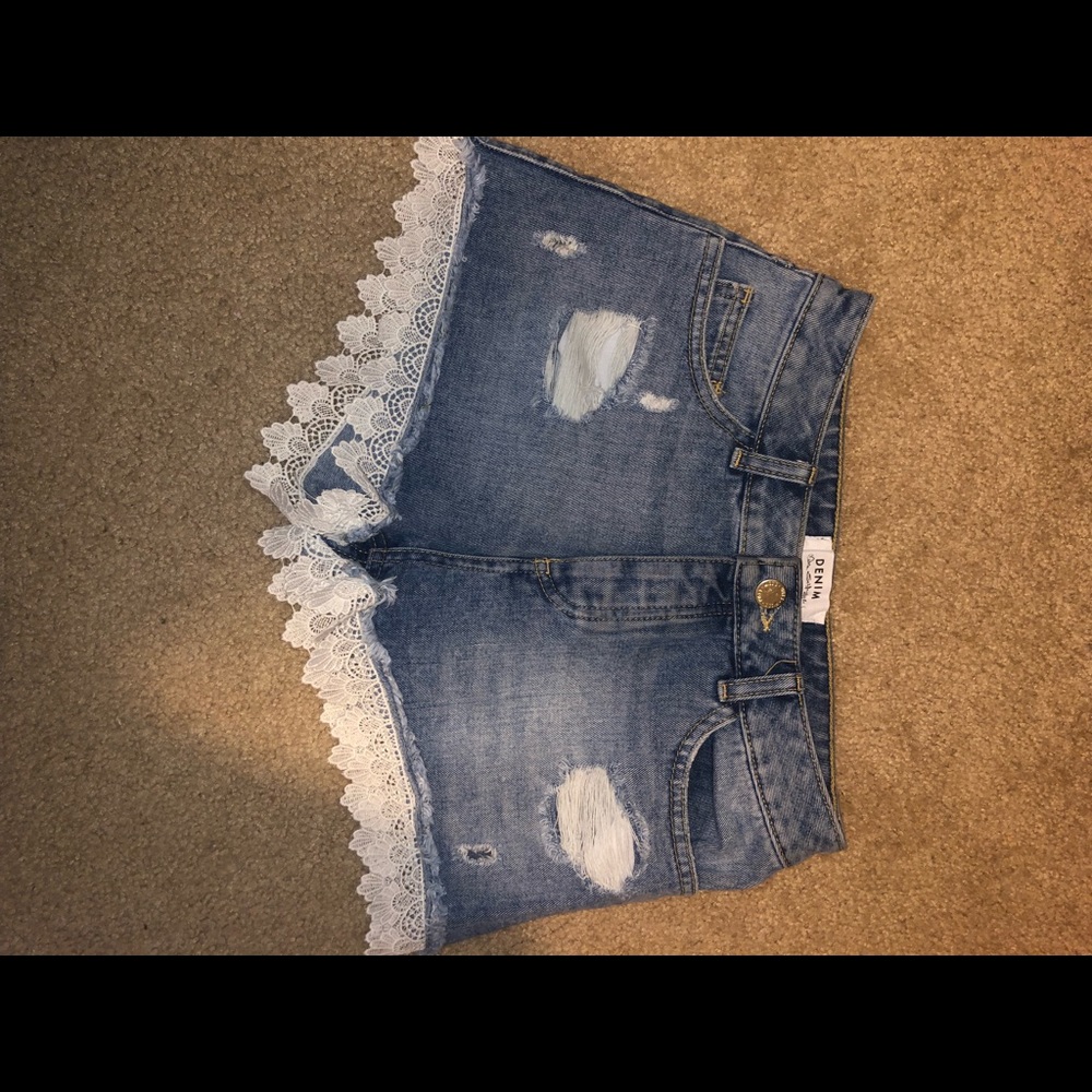 Denim shorts with lace detail